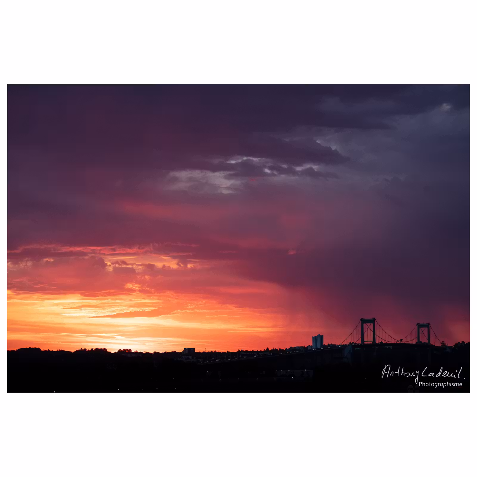 photographie du lever de soleil sur le pont d'Aquitaine