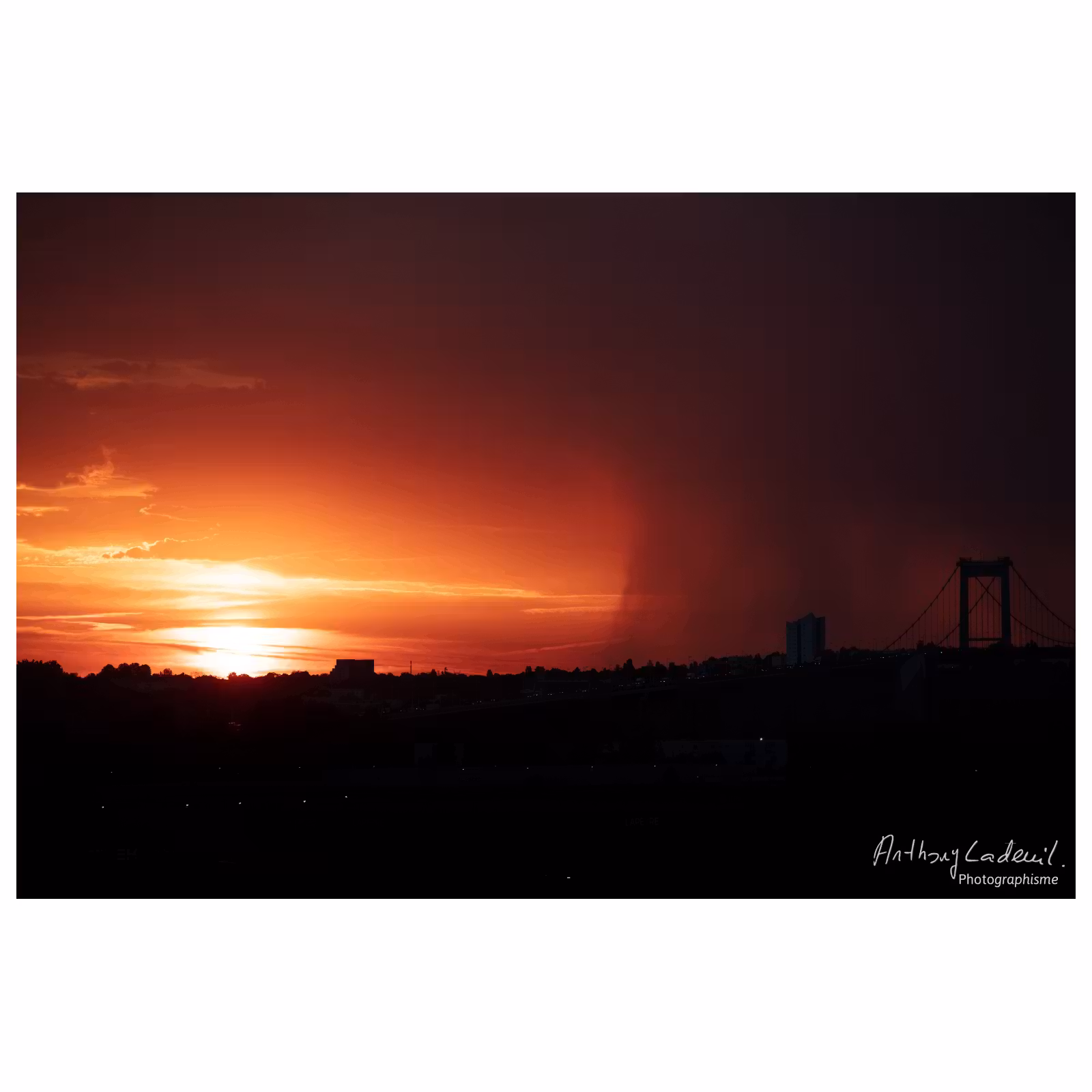 photographie du lever de soleil sur le pont d'Aquitaine